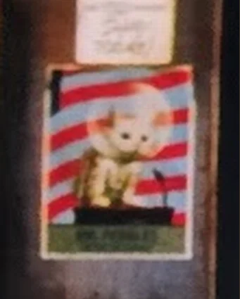 Close crop of the poster as it appears in the frame